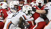 Oct 4, 2025; Louisville, Kentucky, USA; Virginia Cavaliers running back J'Mari Taylor (3) runs the ball in for a touchdown during the overtime against the Louisville Cardinals at L&N Federal Credit Union Stadium. Virginia defeated Louisville 30-27. Mandatory Credit: Jamie Rhodes-Imagn Images