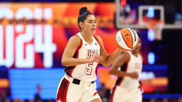 Jul 20, 2024; Phoenix, AZ, USA; USA Women's National Team guard Kelsey Plum (5) during the WNBA All Star game at Footprint Center. Mandatory Credit: Mark J. Rebilas-Imagn Images