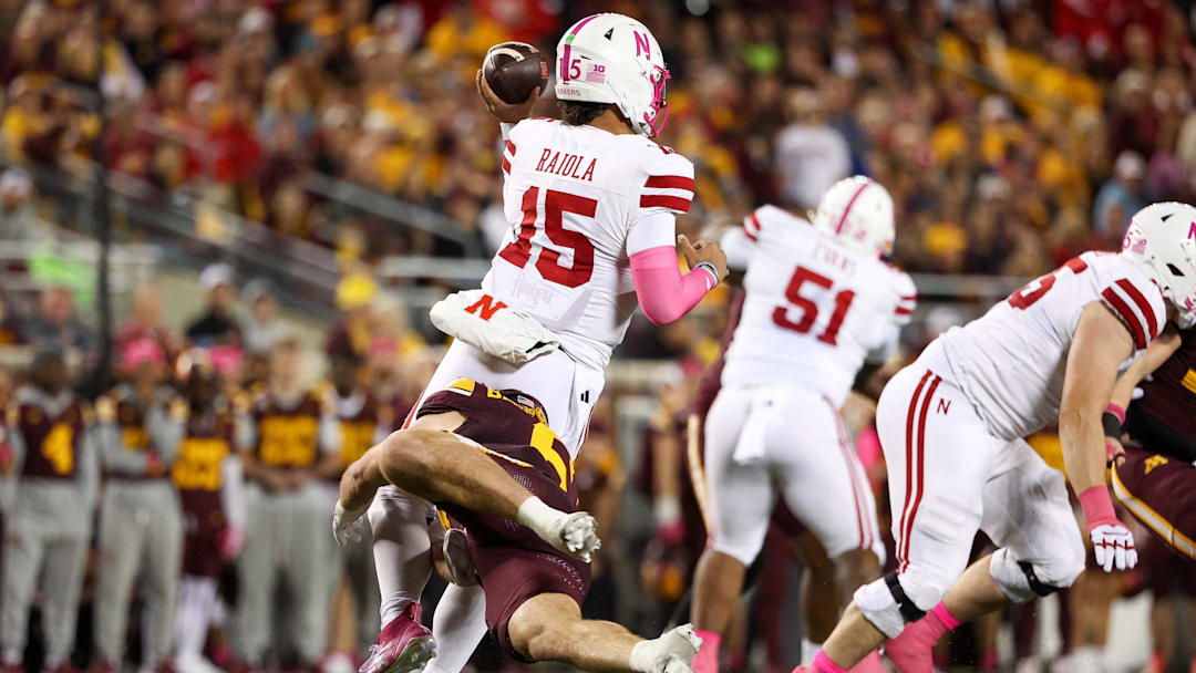 Dylan Raiola was pressured all night, including this play where he improvised with a left-handed completion to tight end Luke Lindenmeyer.