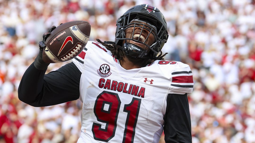 Oct 19, 2024; Norman, Oklahoma, USA;  South Carolina Gamecocks defensive tackle Tonka Hemingway (91) reacts after returning a fumble for a touchdown during the first half against the Oklahoma Sooners at Gaylord Family-Oklahoma Memorial Stadium. Mandatory Credit: Kevin Jairaj-Imagn Images