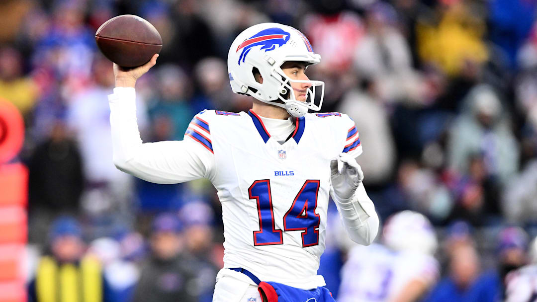 Jan 5, 2025; Foxborough, Massachusetts, USA; Buffalo Bills quarterback Mike White (14) looks to throw against the New England Patriots during the second half at Gillette Stadium. Mandatory Credit: Brian Fluharty-Imagn Images