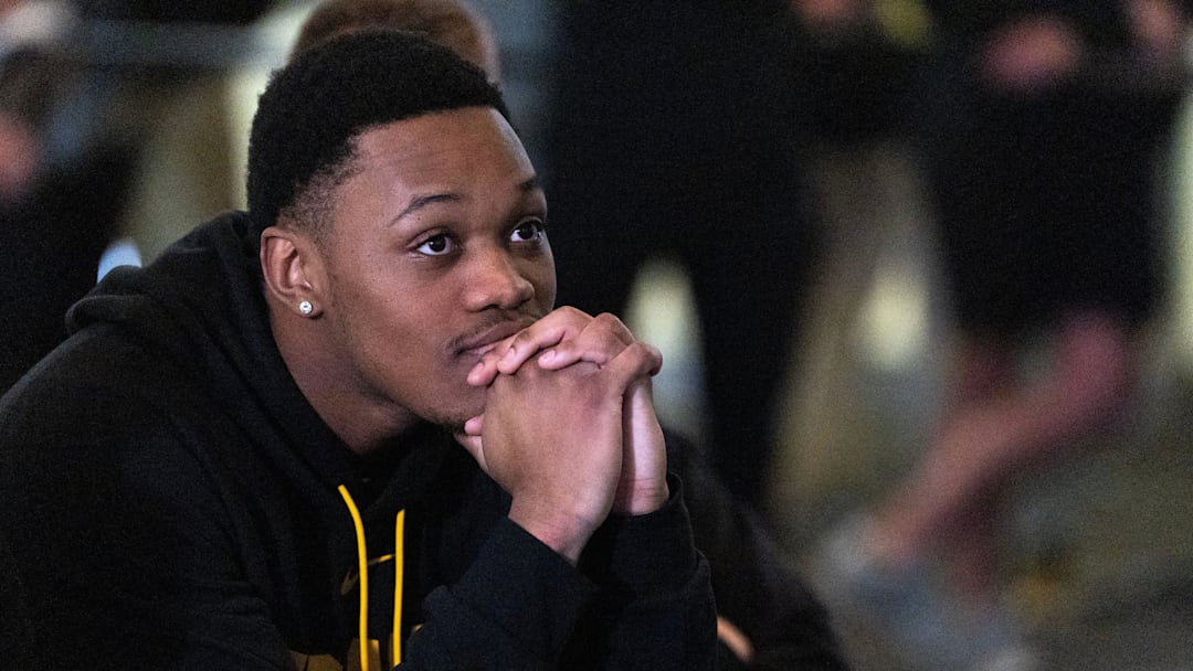 Iowa forward Cam Manyawu watches a broadcast unveiling the NCAA Tournament bracket March 15, 2026 at Carver-Hawkeye Arena in Iowa City, Iowa.