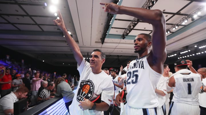 Nov 24, 2017;  Paradise Island, BAHAMAS; Villanova Wildcats guard Mikal Bridges (25) and head coach Jay Wright wave to fans after the game against the Northern Iowa Panthers in the 2017 Battle 4 Atlantis Championship game in Imperial Arena at the Atlantis Resort. Mandatory Credit: Kevin Jairaj-USA TODAY Sports