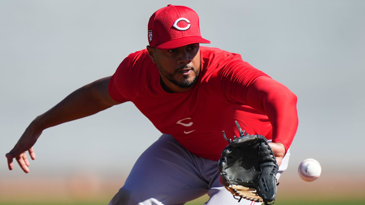 Cincinnati Reds infielder Jeimer Candelario fields a ground ball at third base