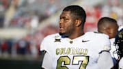 Oct 19, 2024; Tucson, Arizona, USA; Colorado Buffaloes offensive lineman Kahlil Benson (67) against the Arizona Wildcats at Arizona Stadium. Mandatory Credit: Mark J. Rebilas-Imagn Images