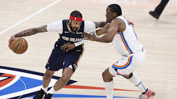 Apr 21, 2024; Oklahoma City, Oklahoma, USA; New Orleans Pelicans forward Brandon Ingram (14) drives around Oklahoma City Thunder forward Jalen Williams (8) during the first quarter of game one of the first round for the 2024 NBA playoffs at Paycom Center. 