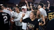 Vanderbilt staffers celebrate their win over #1 Alabama after their game at Vanderbilt Stadium in Nashville.