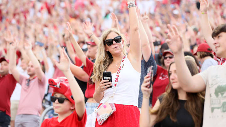 Aug 29, 2024; Little Rock, Arkansas, USA; Arkansas Razorbacks fans “call the hogs” prior to the game against the Pine Bluff Golden Lions at War Memorial Stadium. Mandatory Credit: Nelson Chenault-Imagn Images