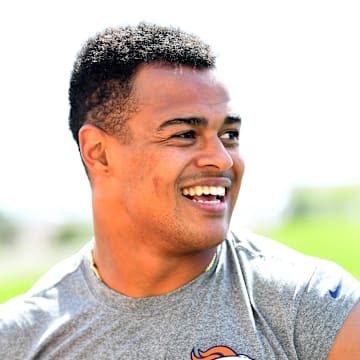 Jun 4, 2019; Denver, CO, USA; Denver Broncos tight end Noah Fant (87) reacts following mini camp drills at the Pat Bowlen Fieldhouse at UCHealth Training Center. Mandatory Credit: Ron Chenoy-Imagn Images