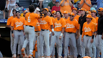 May 22, 2025; Hoover, AL, USA; Tennessee shortstop Gavin Kilen (6) is congratulated by teammates  the lead in the 10th inning in the third round of the SEC Baseball Tournament at the Hoover Met. Tennessee eliminated Texas with a 12-inning 7-5 victory. Kilen drove in all three runs in extra innings.