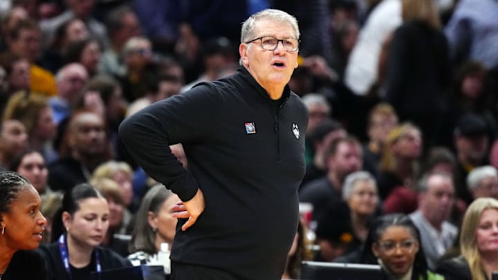 Apr 5, 2024; Cleveland, OH, USA; Connecticut Huskies head coach Geno Auriemma looks on in the first quarter against the Iowa Hawkeyes in the semifinals of the Final Four of the womens 2024 NCAA Tournament at Rocket Mortgage FieldHouse. Mandatory Credit: Kirby Lee-Imagn Images