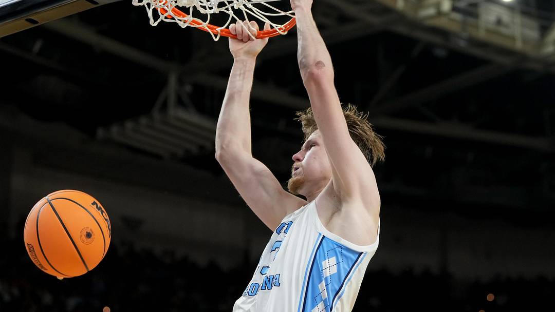 Mar 19, 2026; Greenville, SC, USA; North Carolina Tar Heels center Henri Veesaar (13) dunks the ball against the VCU Rams in the second half of a first round game of the men's 2026 NCAA Tournament at Bon Secours Wellness Arena. Mandatory Credit: Bob Donnan-Imagn Images