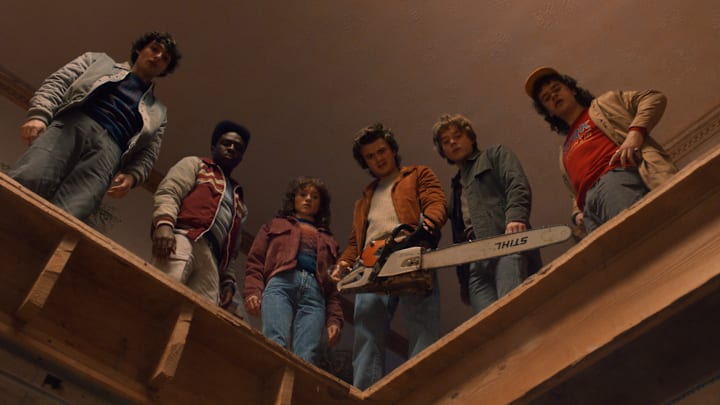 (L to R) Finn Wolfhard as Mike Wheeler, Caleb McLaughlin as Lucas Sinclair, Natalia Dyer as Nancy Wheeler, Joe Keery as Steve Harrington, Charlie Heaton as Jonathan Byers, and Gaten Matarazzo as Dustin Henderson in Stranger Things season 5