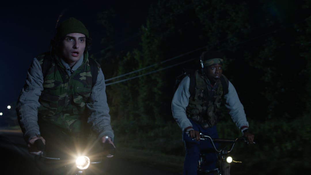 (L to R) Finn Wolfhard as Mike Wheeler and Caleb McLaughlin as Lucas Sinclair in Stranger Things season 5