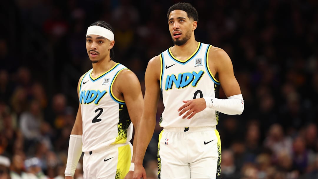Indiana Pacers guards Andrew Nembhard (2) and Tyrese Haliburton (0)
