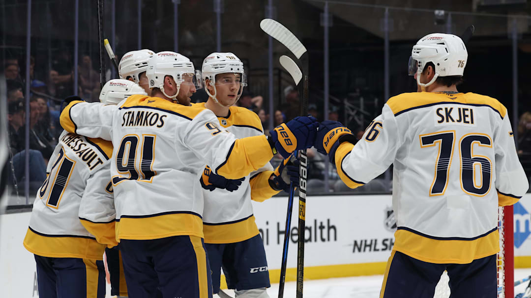 Apr 10, 2025; Salt Lake City, Utah, USA; The Nashville Predators celebrate a goal against the Utah Hockey Club during the third period at Delta Center. Mandatory Credit: Rob Gray-Imagn Images