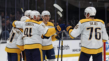 Apr 10, 2025; Salt Lake City, Utah, USA; The Nashville Predators celebrate a goal against the Utah Hockey Club during the third period at Delta Center. Mandatory Credit: Rob Gray-Imagn Images