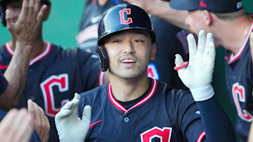 Jul 26, 2025; Kansas City, Missouri, USA; Cleveland Guardians left fielder Steven Kwan (38) celebrates in the dugout after hitting a two run home run against the Kansas City Royals in the fourth inning at Kauffman Stadium. Mandatory Credit: Denny Medley-Imagn Images