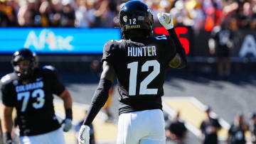 Sep 9, 2023; Boulder, Colorado, USA; Colorado Buffaloes cornerback Travis Hunter (12) reacts after a turnover against the Nebraska Cornhuskers in the first quarter at Folsom Field. Mandatory Credit: Ron Chenoy-USA TODAY Sports