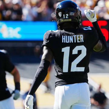 Sep 9, 2023; Boulder, Colorado, USA; Colorado Buffaloes cornerback Travis Hunter (12) reacts after a turnover against the Nebraska Cornhuskers in the first quarter at Folsom Field. Mandatory Credit: Ron Chenoy-USA TODAY Sports