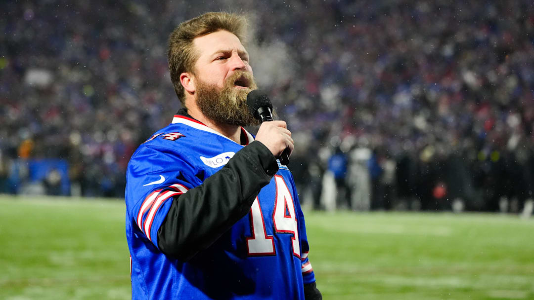 Jan 19, 2025; Orchard Park, New York, USA; Former Buffalo Bills quarterback Ryan Fitzpatrick greets the crowd before the game against the Baltimore Ravens in a 2025 AFC divisional round game at Highmark Stadium.