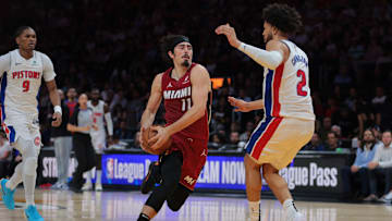 Mar 19, 2025; Miami, Florida, USA; Miami Heat guard Jaime Jaquez Jr. (11) drives to the basket against Detroit Pistons guard Cade Cunningham (2) during the second quarter at Kaseya Center. Mandatory Credit: Sam Navarro-Imagn Images