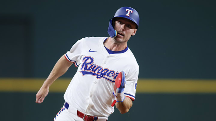 May 14, 2025; Arlington, Texas, USA; Texas Rangers outfielder Evan Carter (32) rounds third base to score a run against the Colorado Rockies during the fifth inning at Globe Life Field. May 14, 2025; Arlington, Texas, USA; Texas Rangers outfielder Evan Carter (32) rounds third base to score a run against the Colorado Rockies during the fifth inning at Globe Life Field.