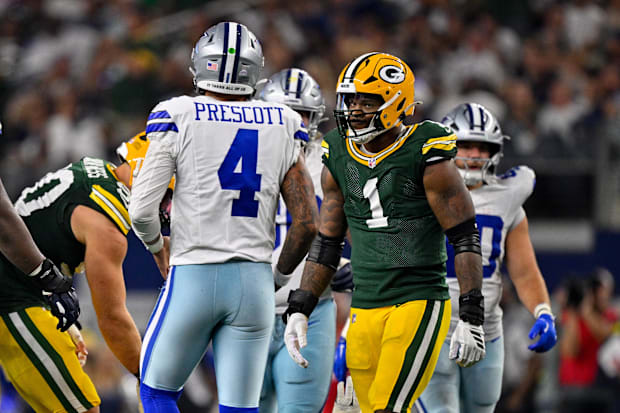 Green Bay Packers defensive end Micah Parsons stares at Dallas Cowboys quarterback Dak Prescott. 