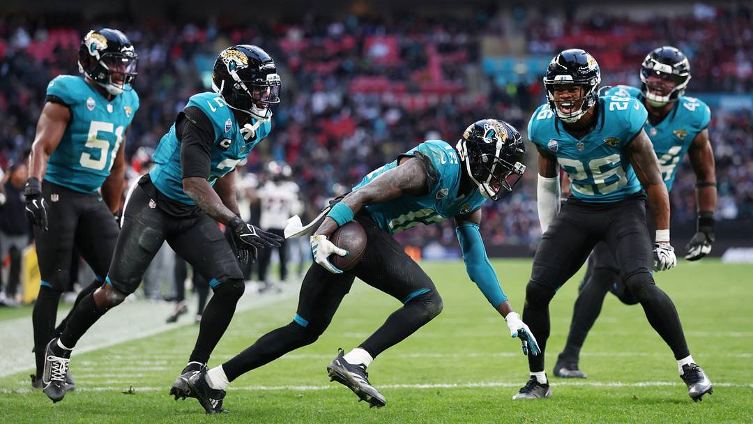 Jacksonville Jaguars' Travis Hunter celebrates intercepting a pass from Houston Texans' C.J. Stroud 