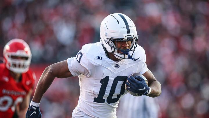 Nov 29, 2025; Piscataway, New Jersey, USA; Penn State Nittany Lions running back Nicholas Singleton (10) carries the ball against the Rutgers Scarlet Knights during the first half at SHI Stadium. Mandatory Credit: Vincent Carchietta-Imagn Images