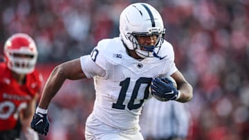 Nov 29, 2025; Piscataway, New Jersey, USA; Penn State Nittany Lions running back Nicholas Singleton (10) carries the ball against the Rutgers Scarlet Knights during the first half at SHI Stadium. Mandatory Credit: Vincent Carchietta-Imagn Images