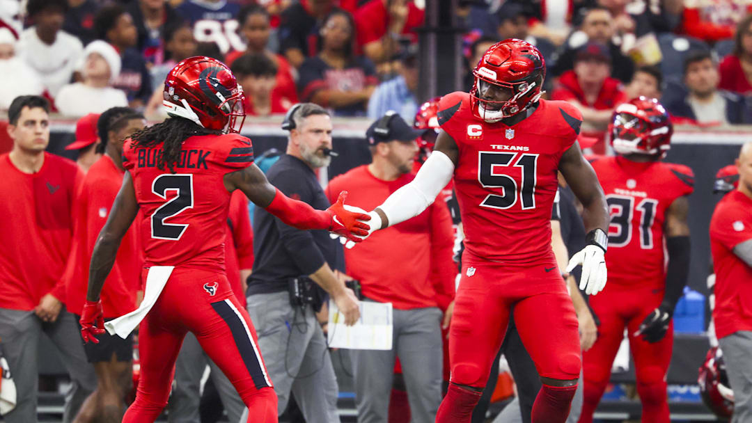 Dec 21, 2025; Houston, Texas, USA; Houston Texans defensive end Will Anderson Jr. (51) and safety Calen Bullock (2) react to a play against the Las Vegas Raiders during the second quarter at NRG Stadium. Mandatory Credit: Troy Taormina-Imagn Images