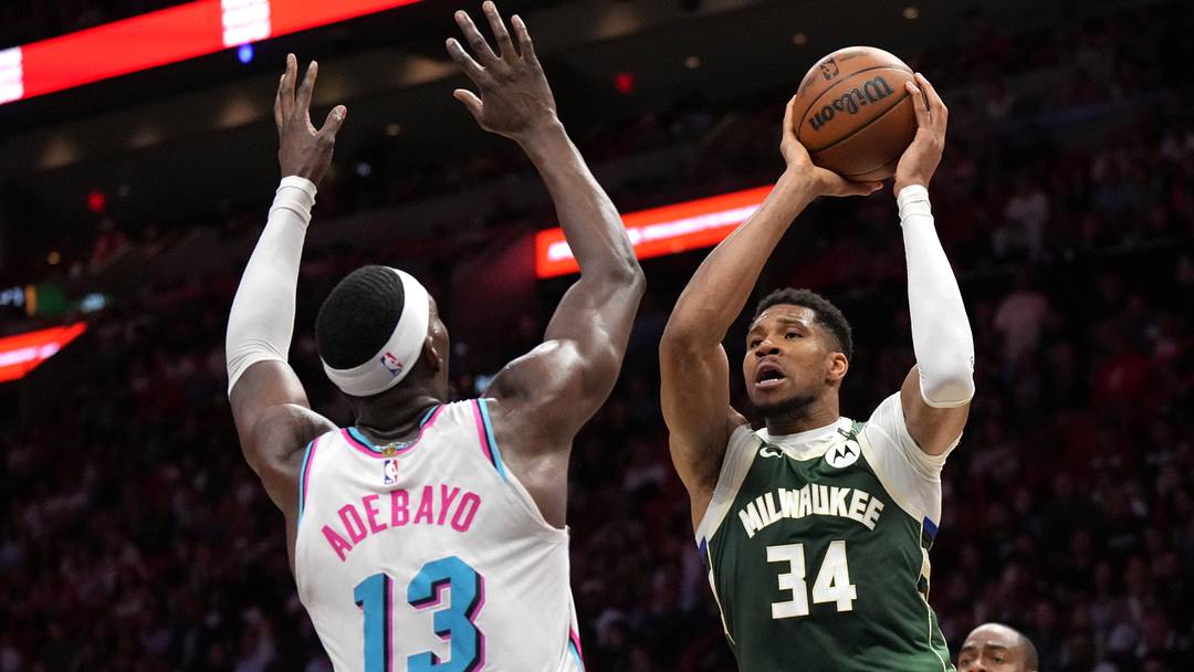 Apr 5, 2025; Miami, Florida, USA; Milwaukee Bucks forward Giannis Antetokounmpo (34) looks to pass the ball as Miami Heat center Bam Adebayo (13) defends during overtime at Kaseya Center. Mandatory Credit: Jim Rassol-Imagn Images Apr 5, 2025; Miami, Florida, USA; Milwaukee Bucks forward Giannis Antetokounmpo (34) looks to pass the ball as Miami Heat center Bam Adebayo (13) defends during overtime at Kaseya Center. Mandatory Credit: Jim Rassol-Imagn Images