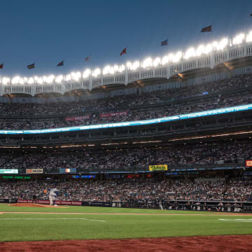 Jun 8, 2024; Bronx, New York, USA; Los Angeles Dodgers starting pitcher Gavin Stone (35) throws to New York Yankees center fielder Aaron Judge (99) at Yankee Stadium. Mandatory Credit: Vincent Carchietta-USA TODAY Sports
