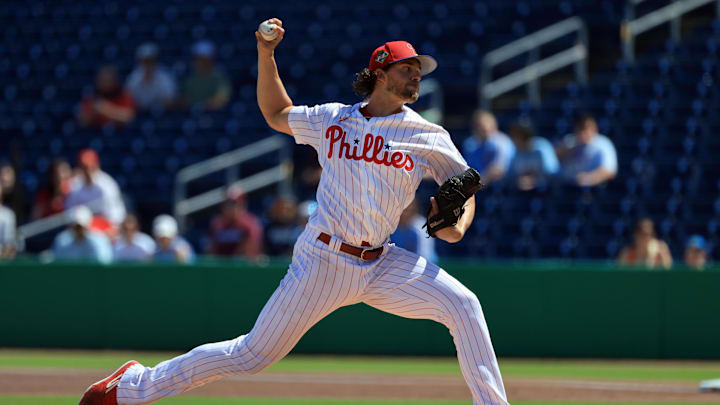 Mar 4, 2026; Clearwater, FL, USA; Philadelphia Phillies starting pitcher Aaron Nola (27) throws a pitch during the first inning against Team Canada at BayCare Ballpark. Mandatory Credit: Kim Klement Neitzel-Imagn Images
