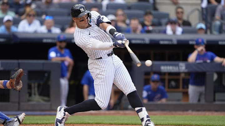 New York Yankees right fielder Aaron Judge (99) hits a double during the fourth inning at Yankee Stadium. New York Yankees right fielder Aaron Judge (99) hits a double during the fourth inning at Yankee Stadium.