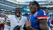 New York Giants wide receiver Malik Nabers (1) talks with Washington Commanders cornerback Mike Sainristil (0) after a game between the New York Giants and the Washington Commanders at MetLife Stadium in East Rutherford on Sunday, Nov. 3, 2024.