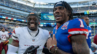 New York Giants wide receiver Malik Nabers (1) talks with Washington Commanders cornerback Mike Sainristil (0) after a game between the New York Giants and the Washington Commanders at MetLife Stadium in East Rutherford on Sunday, Nov. 3, 2024.