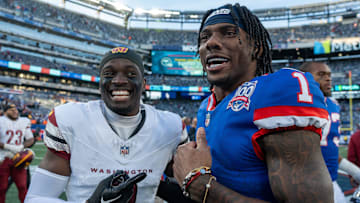New York Giants wide receiver Malik Nabers (1) talks with Washington Commanders cornerback Mike Sainristil (0) after a game between the New York Giants and the Washington Commanders at MetLife Stadium in East Rutherford on Sunday, Nov. 3, 2024.