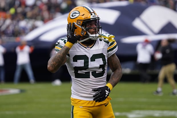 Green Bay Packers cornerback Jaire Alexander gestures to the fans before the game against the Chicago Bears.