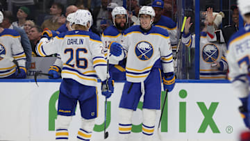 Mar 6, 2025; Tampa, Florida, USA; Buffalo Sabres center Tage Thompson (72) is congratulated by defenseman Rasmus Dahlin (26) after he scored a goal against the Tampa Bay Lightning during the second period at Amalie Arena. Mandatory Credit: Kim Klement Neitzel-Imagn Images