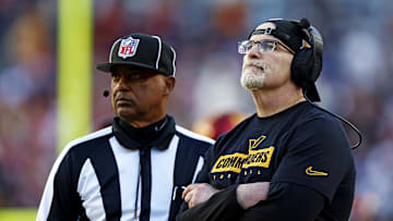 Nov 24, 2024; Landover, Maryland, USA; Washington Commanders head coach Dan Quinn watches a replay on the video board during the third quarter of the game against the Dallas Cowboys at Northwest Stadium. Mandatory Credit: Peter Casey-Imagn Images