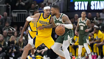 Milwaukee Bucks guard Damian Lillard drives against Indiana Pacers guard Andrew Nembhard in the first half during game three of the first round for the 2024 NBA Playoffs at Fiserv Forum on Friday.
