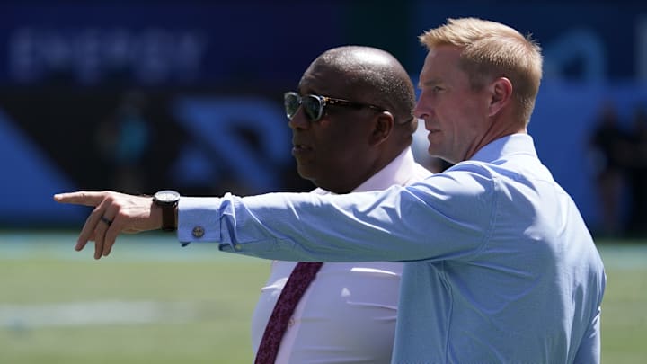Mar 29, 2025; Arlington, TX, USA; Fox Sports broadcast team of Curt Menefee and Joel Klatt stand on the field prior to a game between the Arlington Renegades and the San Antonio Brahmas at Choctaw Stadium. Mandatory Credit: Raymond Carlin III-Imagn Images