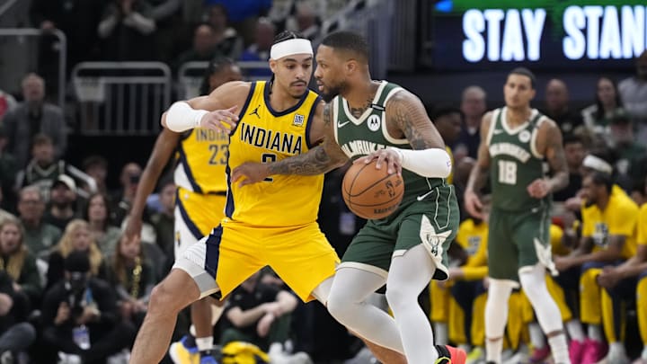 Apr 25, 2025; Milwaukee, Wisconsin, USA; Milwaukee Bucks guard Damian Lillard (0) drives against Indiana Pacers guard Andrew Nembhard (2) in the first half during game three of the first round for the 2024 NBA Playoffs at Fiserv Forum. Mandatory Credit: Michael McLoone-Imagn Images Apr 25, 2025; Milwaukee, Wisconsin, USA; Milwaukee Bucks guard Damian Lillard (0) drives against Indiana Pacers guard Andrew Nembhard (2) in the first half during game three of the first round for the 2024 NBA Playoffs at Fiserv Forum. Mandatory Credit: Michael McLoone-Imagn Images