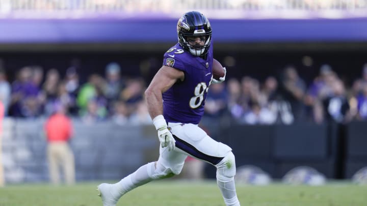 Nov 5, 2023; Baltimore, Maryland, USA;  Baltimore Ravens tight end Mark Andrews (89) runs with the ball against the Seattle Seahawks during the third quarter at M&T Bank Stadium. Mandatory Credit: Jessica Rapfogel-USA TODAY Sports