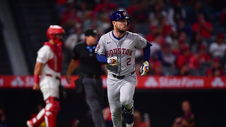 Sep 13, 2024; Anaheim, California, USA; Houston Astros third baseman Alex Bregman (2) hits a single against the Los Angeles Angels during the seventh inning at Angel Stadium.