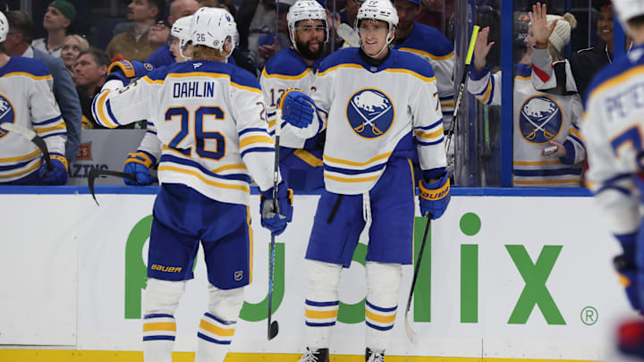 Mar 6, 2025; Tampa, Florida, USA; Buffalo Sabres center Tage Thompson (72) is congratulated by defenseman Rasmus Dahlin (26) after he scored a goal against the Tampa Bay Lightning during the second period at Amalie Arena. Mandatory Credit: Kim Klement Neitzel-Imagn Images