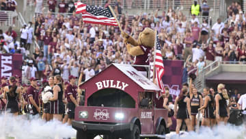 Sep 11, 2021; Starkville, Mississippi, USA; Mississippi State Bulldogs mascot Bully waves an American flag