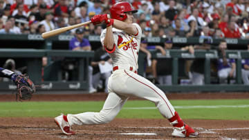 Aug 5, 2023; St. Louis, Missouri, USA;  St. Louis Cardinals shortstop Tommy Edman (19) hits a two run triple against the Colorado Rockies during the sixth inning at Busch Stadium. Mandatory Credit: Jeff Curry-USA TODAY Sports